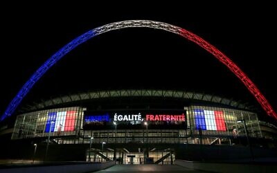 The Wembley arch is lit in the colours of the French flag after terror attacks in Paris