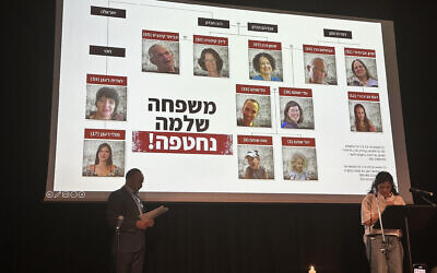 Photographs of family members kidnapped by Hamas displayed as Limor Sella Broyde speaks at JW3 event