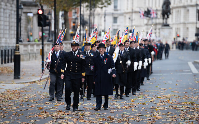 Veterans march in the annual parade by AJEX, the Jewish Military Association, to honour and remember the service of Jewish servicemen and women 'who fought and served for freedom since World War I' at the Cenotaph, Whitehall, London.