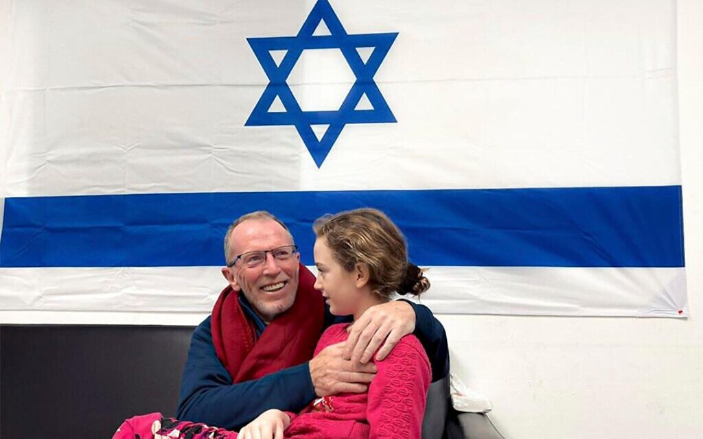 Emily Hand reunites with her father.