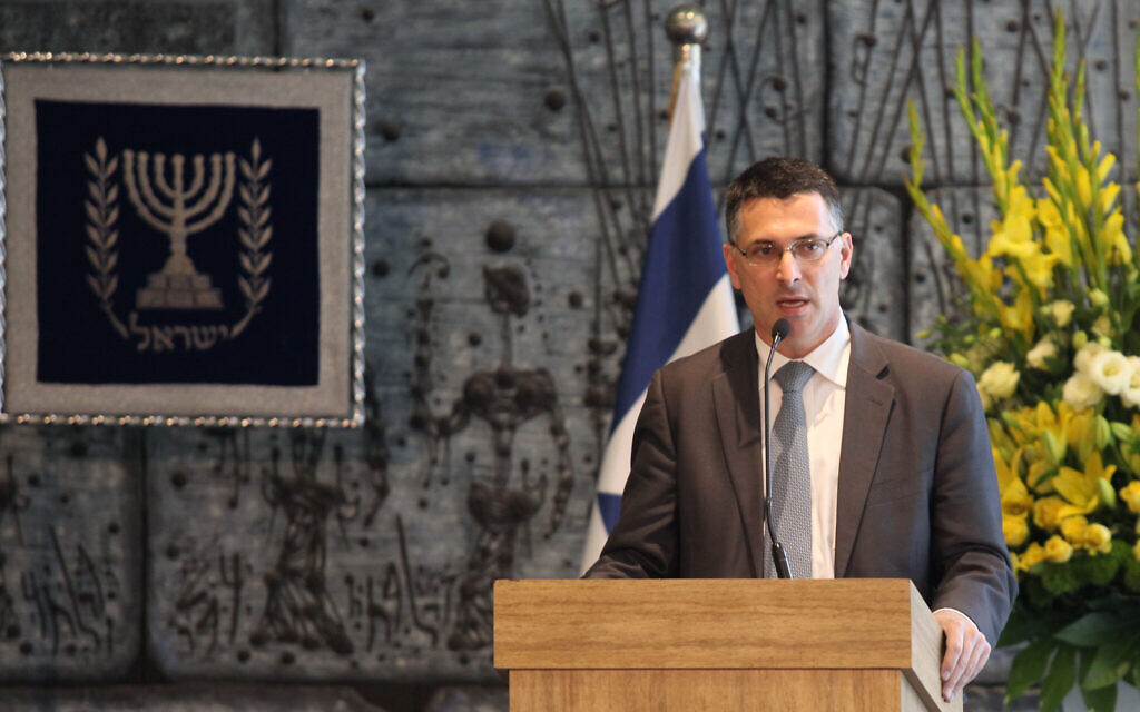 Security cabinet member Gideon Sa'ar addresses a media briefing