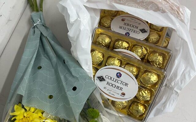 Flowers and chocolates gifted to Hatzola volunteer