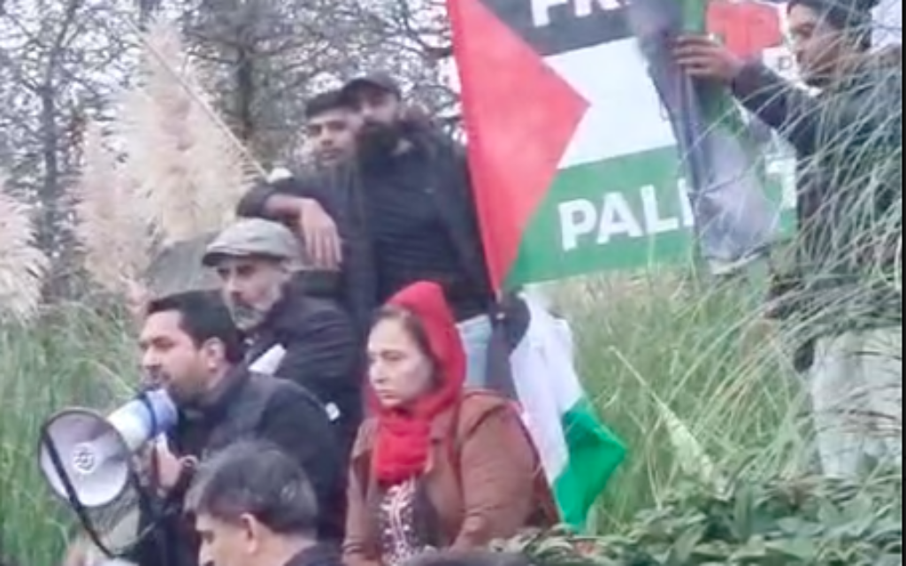 Councillor Tamoor Tariq speaking at the protest in Bury