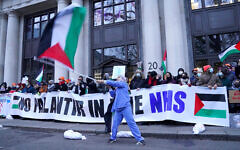 Health workers form a blockade in Soho Square during a protest outside the London headquarters of US tech giant Palantir, which was awarded a £330 million contract by NHS England last month to create a new data management system called the Federated Data Platform.
