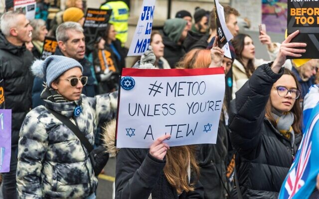 # Me Too Unless you are a Jew placard, March against antisemitism, tens of thousands people protest against a rise in hate crimes against Jews in London