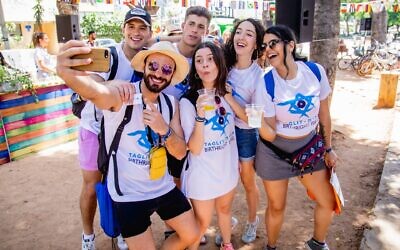 A group of Birthright Israel participants takes a selfie while touring the country on one of the group's free trips for young adults. (Courtesy Birthright)