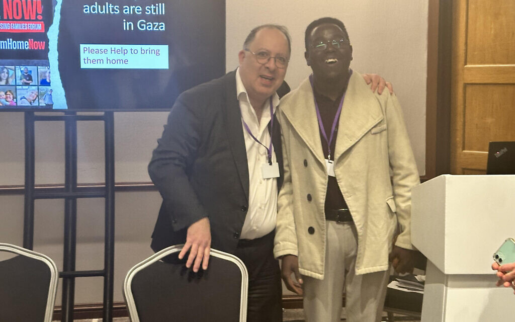 HIAS/JCORE chief executive Rabbi David Mason with Monim Haroon