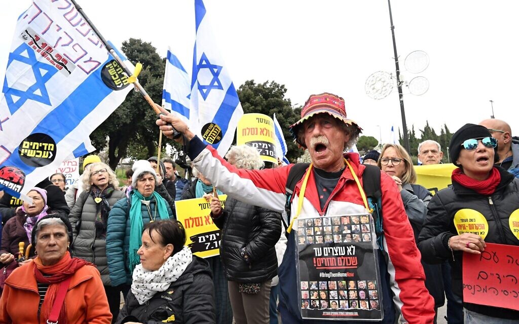 Israelis hold signs calling for Israeli Prime Minister Benjamin Netanyahu to resign for abandoning the nation at a demonstration outside the Knesset, the Parliament, in Jerusalem on Monday, January 14, 2024. Photo by Debbie Hill/ Credit: UPI/Alamy Live News