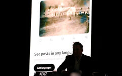 Elon Musk, CEO of Tesla and owner of X (formerly Twitter), sits in front of a video simulating an X feed during the Holocaust during a European Jewish Association conference in Krakow, Poland, Jan. 22, 2024. (Klaudia Radecka/NurPhoto via Getty Images via JTA) Elon Musk, CEO of Tesla and owner of X (formerly Twitter), sits in front of a video simulating an X feed during the Holocaust during a European Jewish Association conference in Krakow, Poland, Jan. 22, 2024. (Klaudia Radecka/NurPhoto via Getty Images via JTA)