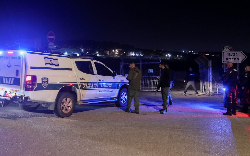 Police and security personnel near the scene of a car-ramming in the West Bank on January 7, 2024. (Jamal Awad/Flash90)