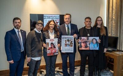 David Cameron with families of hostages. Courtesy: X