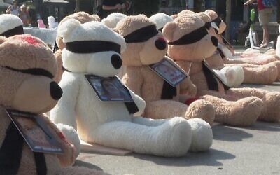 Blindfolded teddy bears in Hostage Square.