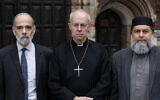 (L-R) Rabbi Jonathan Wittenberg, Archbishop of Canterbury Justin Welby and Sheikh Ibrahim Mogra make a statement at Lambeth Palace in London urging peace among faith communities in the United Kingdom, following the onset of the Israel-Hamas war, Oct. 17, 2023. (Doug Peters/PA Images via Getty Images)