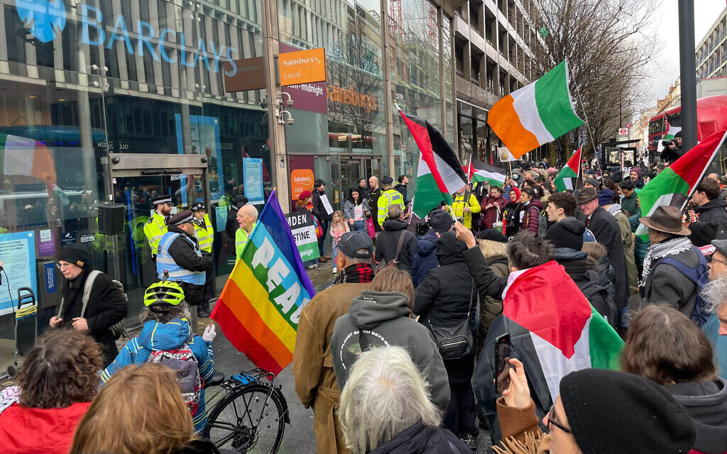 People take part in a Day of Action for Palestine protest in London organised by the Palestine Solidarity Campaign.