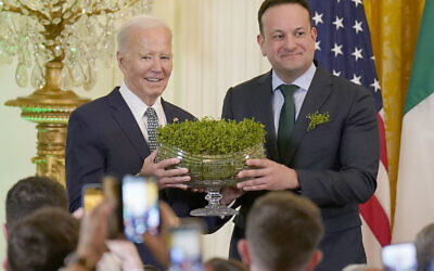 Taoiseach Leo Varadkar and US President Joe Biden during the St Patrick's Day Reception and Shamrock Ceremony in the the East Room of the White House, Washington DC, during his visit to the US for St Patrick's Day. Picture date: Sunday March 17, 2024. PA Photo. See PA story IRISH US. Photo credit should read: Niall Carson/PA Wire