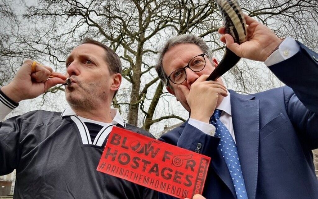 Former referee Douglas Krikler and Rabbi Daniel Epstein of Western Marble Arch Synagogue rehearsing for Blow for Hostages