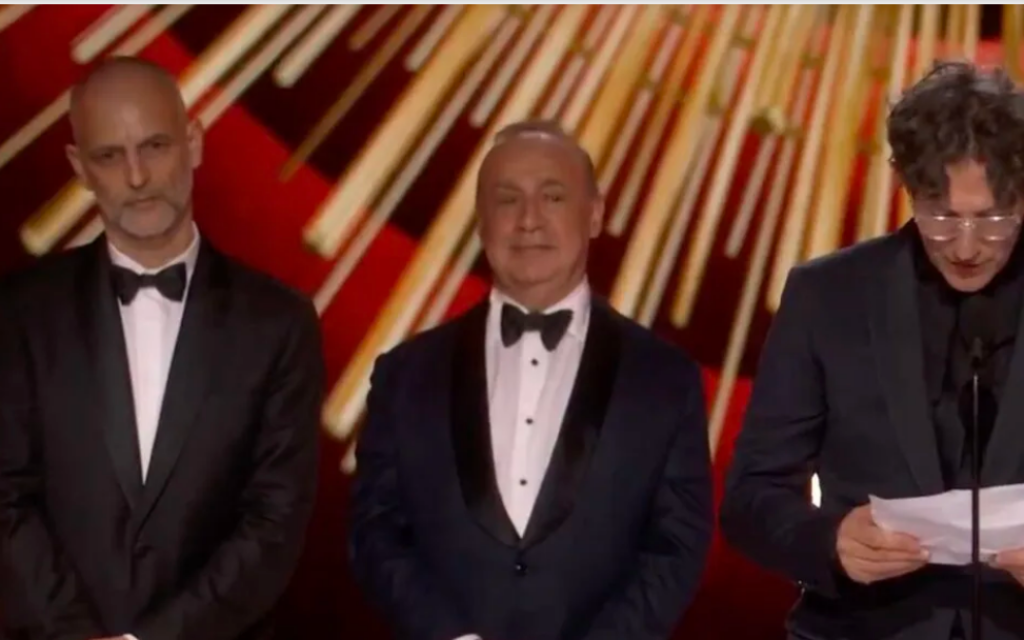 Screenshot. Sir Len Blavatnik, centre.