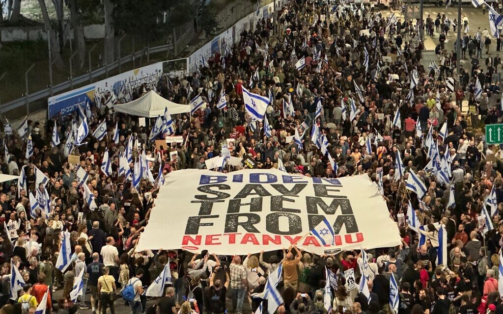 'Biden save them from Netanyahu' - A protest in Begin road in front of the Kirya IDF Military Headquarters in Tel Aviv. Credit: Rony Shapiro