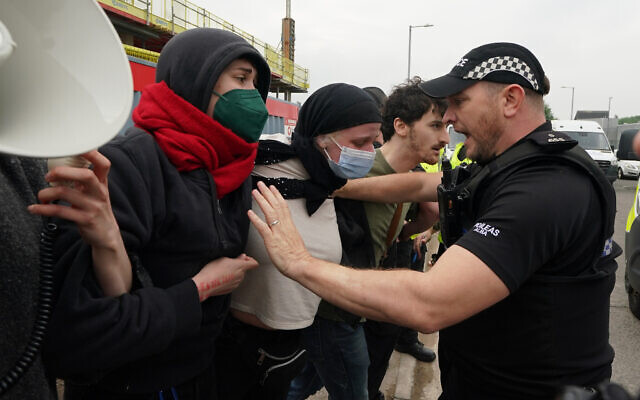 Pro-Palestine campaigners are pushed back by police during a protest outside the Thales factory in Govan, Glasgow, as part of a call for an end to arms sales to Israel. Picture date: Wednesday May 15, 2024. PA Photo. Photo credit should read: Andrew Milligan/PA Wire