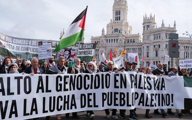 Dozens of people protest during the demonstration against the invasion of Palestine, on February 25, 2024 in Madrid, Spain.