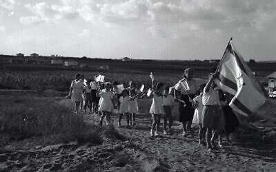 Celebration of Israel's 5th Independence Day in Kfar Mordechai, 1953. 
Photo by Fritz Schlesinger, KKL-JNF Photo Archive