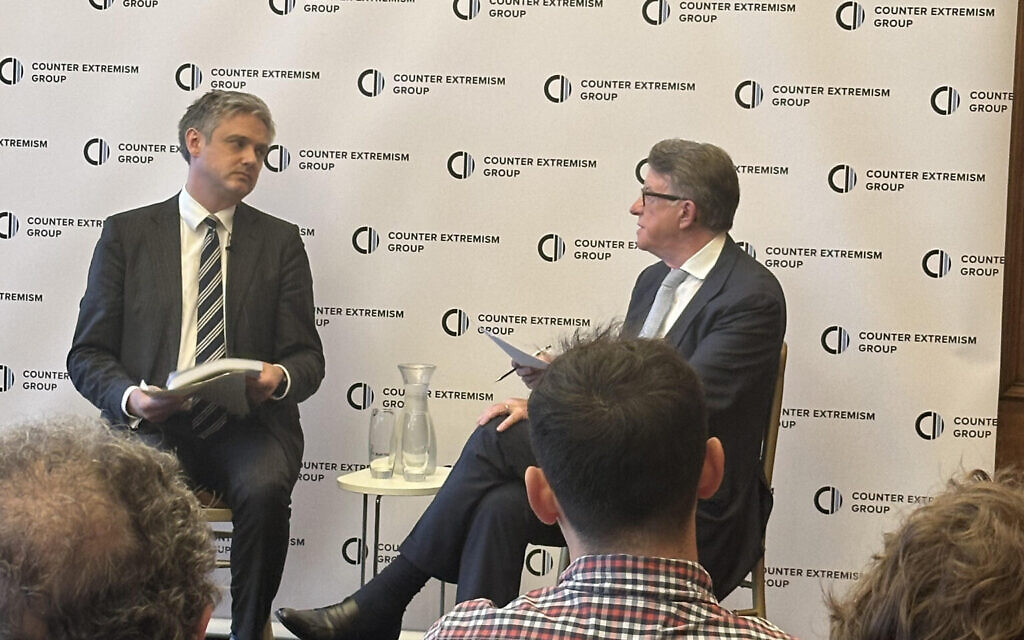 Lord Walney, left, is quizzed by Lord Mandelson at launch of his report into protest extremism