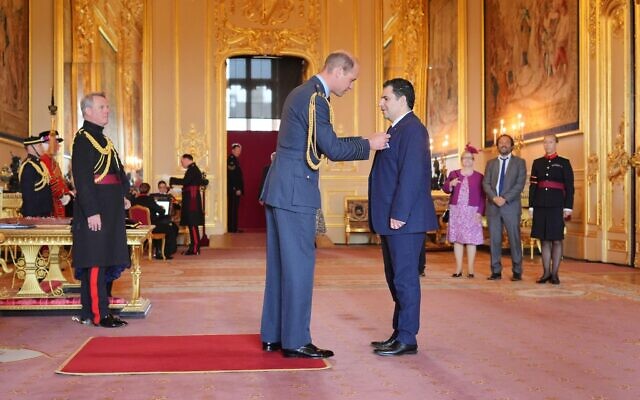 Justin Cohen is made a Member of the Order of the British Empire by the Prince of Wales at Windsor Castle.