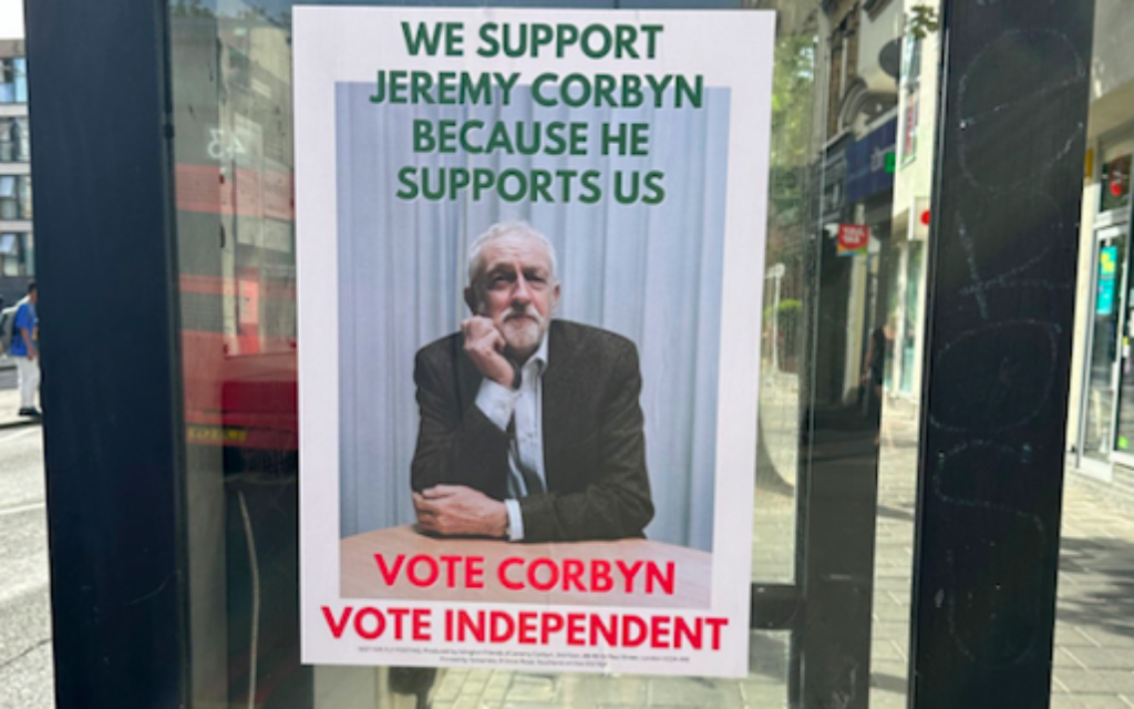 Flyposter on telephone box in Islington North