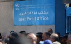 Protesters are seen during a demonstration outside the Gaza City headquarters of the United Nations Relief and Works Agency (UNRWA) for Palestine Refugees. Protesters are seen during a demonstration outside the Gaza City headquarters of the United Nations Relief and Works Agency (UNRWA) for Palestine Refugees.
