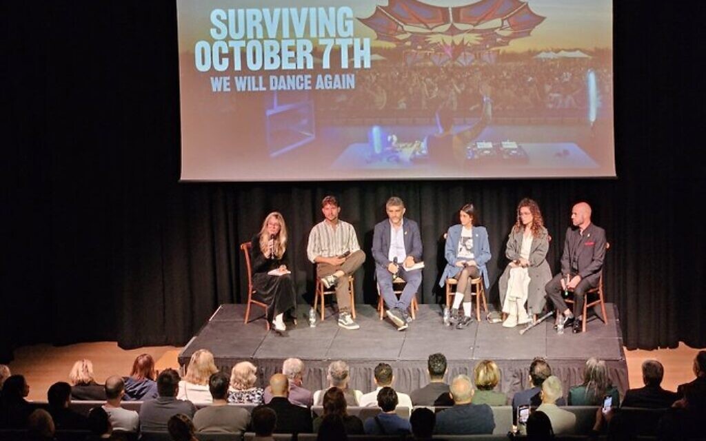 Emma Barnett (far left with survivors Kfir, Ziv and Noam and Moshe Shapiro, father of murdered Aner, and far right, director Yariv Mozer (pic Raymond Simonson)