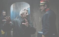 Director Roman Polanski on set An Officer and a Spy.
