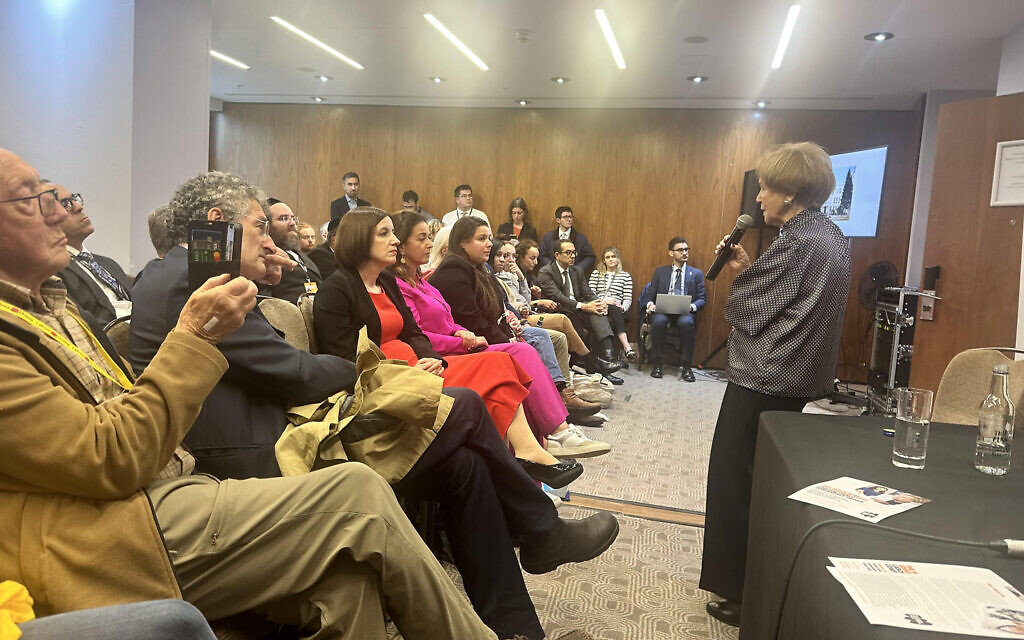 Bridget Phillipson, centre, listens to survivor Mala Tribich