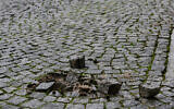 Ripped out stumbling stones. Pic: Initiative Stolpersteine
