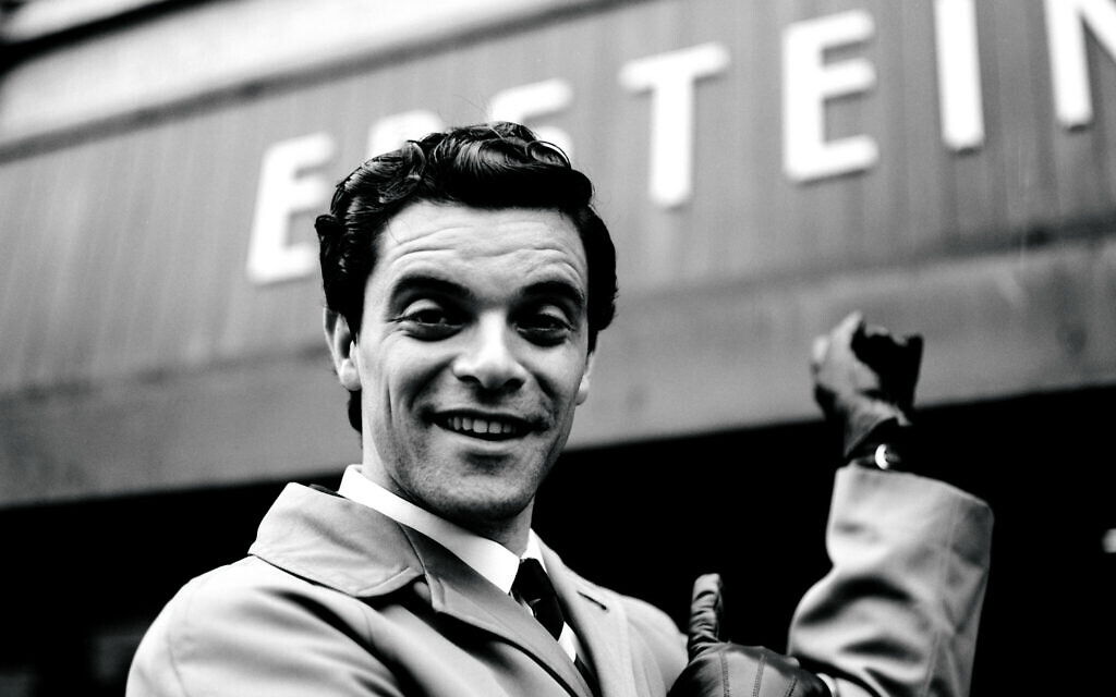 Jacob Fortune-Lloyd as Brian Epstein outside the reimagined Epstein store started by his grandfather