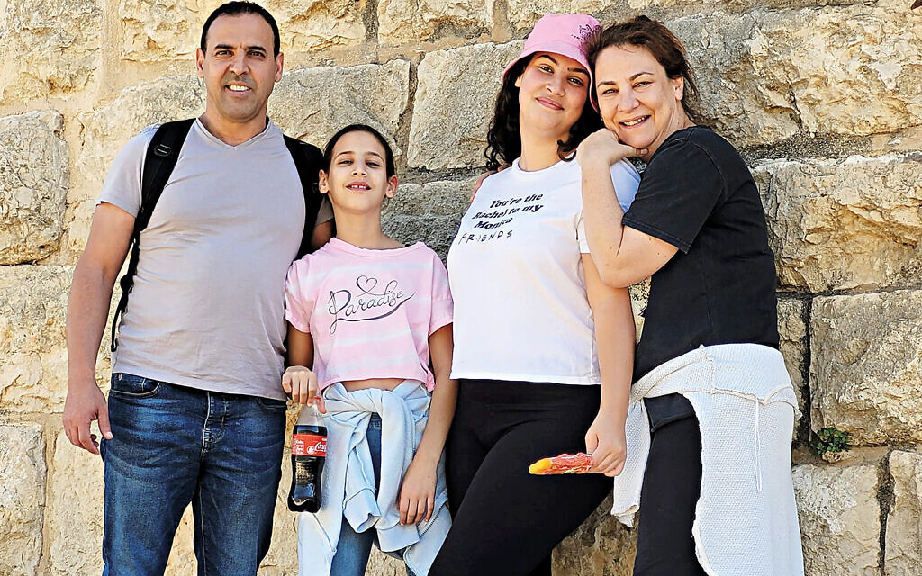 Eli Sharabi (left), his wife Lianne and daughters Noiya (in hat) and Yahel.