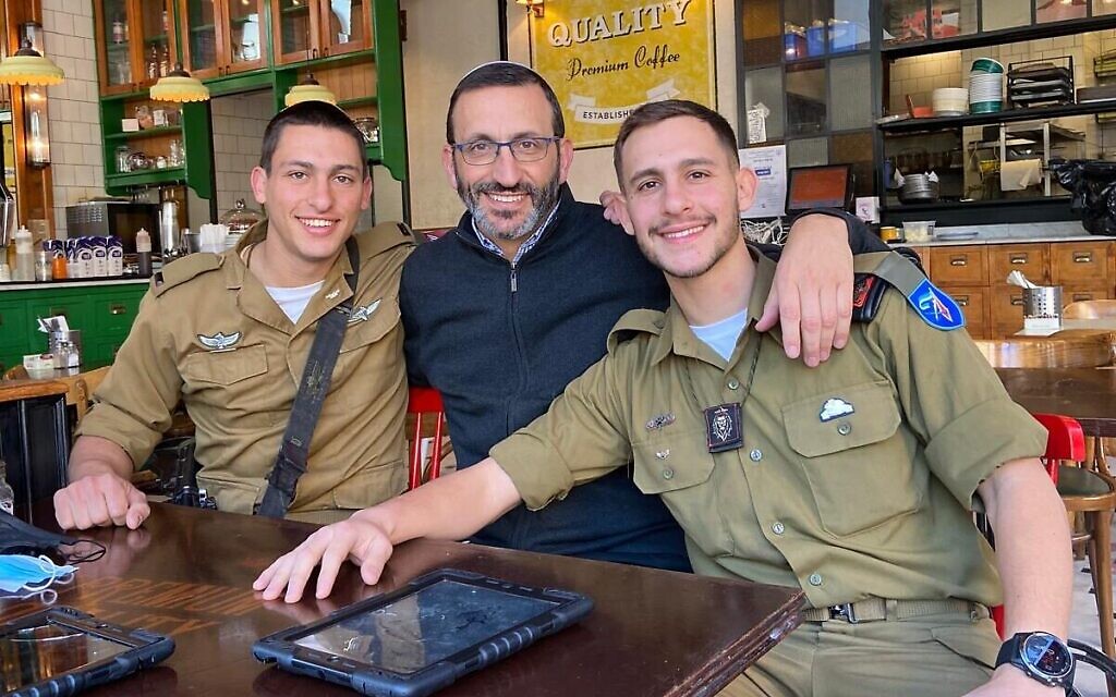 Rabbi Doron Perez with his sons Yonatan (left) and Daniel