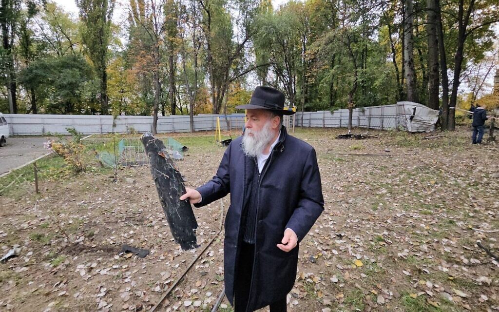 Rabbi Jonathan Markovitch holds a fragment of a Russian drone that damaged the Chabad-run Perlina school in Kyiv, Ukraine, Oct. 30, 2024. (Courtesy Kyiv Jewish Community)