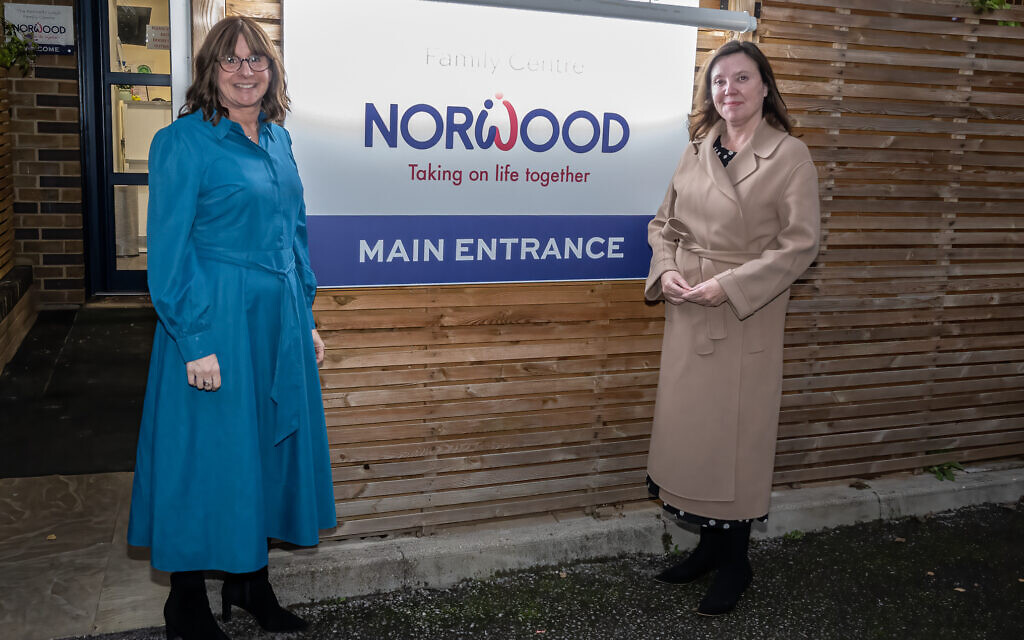 Norwood chief executive Naomi Dickson (left) with Children’s Commissioner for England Fame Rachel de Souza, in front of Norwood’s Kennedy Leigh Children and Family Centre