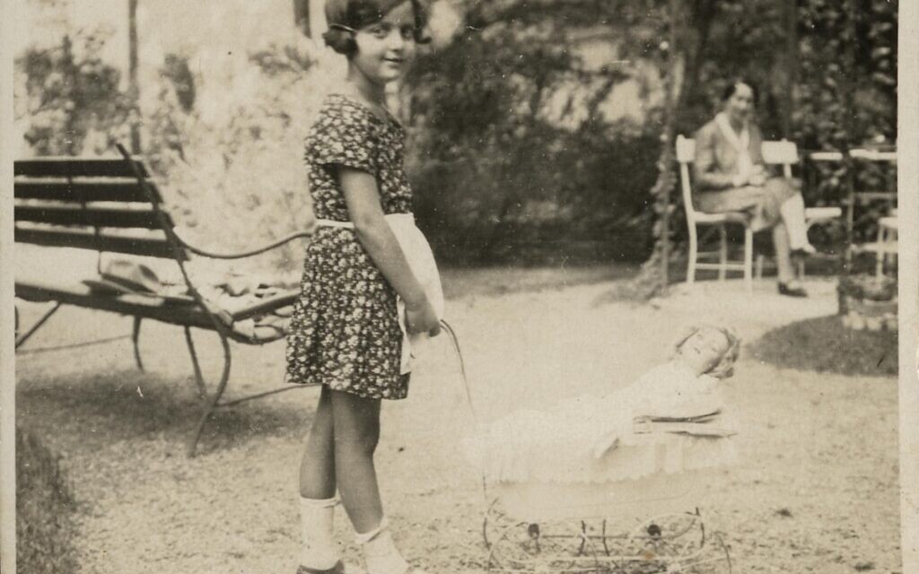 Hannah Senesh as a child in Hungary with her doll and Aunt Irma in the background. From the Senesh Family Archive at the National Library of Israel, courtesy of Ori and Mirit Eisen.