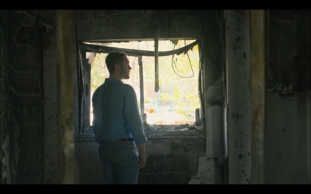 Michael Murphy visits Kibbutz Nir Oz in a scene from his documentary