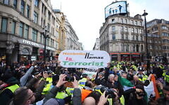 Counter protesters block the road near Piccadilly Circus as people take part in a Palestine Solidarity Campaign rally in central London. Picture date: Saturday November 30, 2024. PA Photo. See PA story PROTEST Israel. Photo credit should read: James Manning/PA Wire