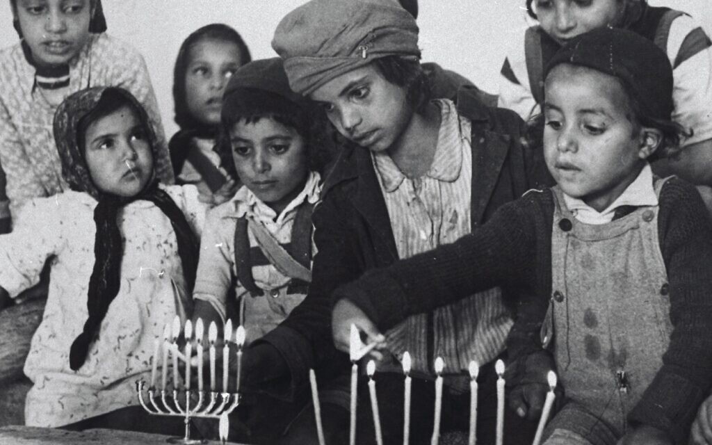 Hanukkah candles lit for the first time in Israel by children of the Jewish Yemenite community of Luzim Hanukkah candles lit for the first time in Israel by children of the Jewish Yemenite community of Luzim