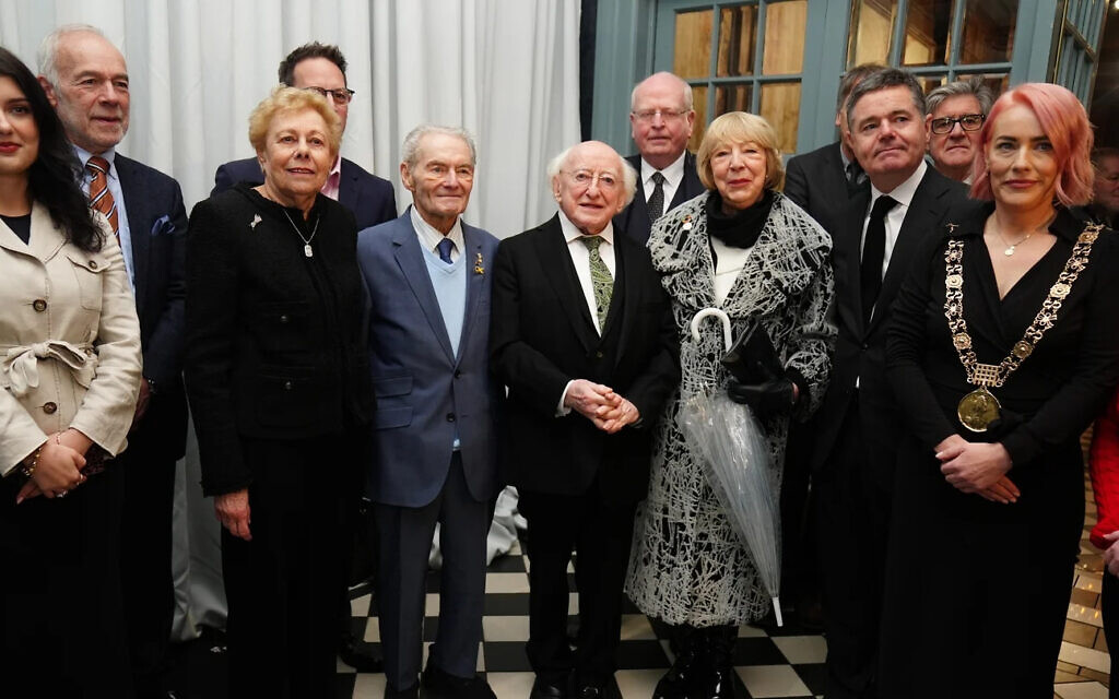 Screenshot: RTE
Michael D Higgins and his wife Sabina with Holocaust survivors Suzi Diamond (third left) and Tomi Reichenthal (fourth left) as they arrive at a Holocaust Memorial Day event at the Mansion House