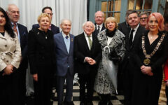 Screenshot: RTE
Michael D Higgins and his wife Sabina with Holocaust survivors Suzi Diamond (third left) and Tomi Reichenthal (fourth left) as they arrive at a Holocaust Memorial Day event at the Mansion House