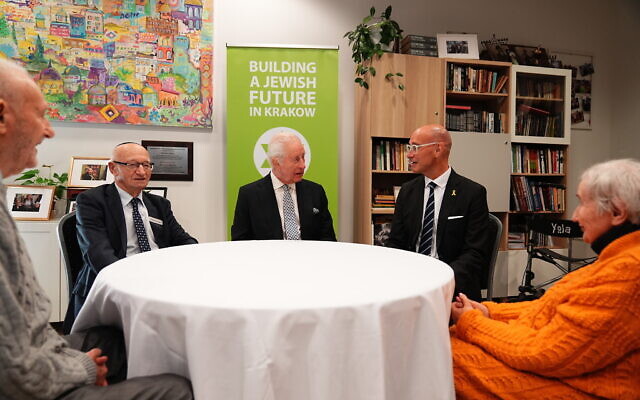 King Charles III (centre) during his visit the Jewish Community Centre (JCC) Krakow, to meet Holocaust survivors and hear from volunteers and members about the centre's support for people of all ages and backgrounds as part of its mission to rebuild Jewish life in the city. King Charles III (centre) during his visit the Jewish Community Centre (JCC) Krakow, to meet Holocaust survivors and hear from volunteers and members about the centre's support for people of all ages and backgrounds as part of its mission to rebuild Jewish life in the city.
