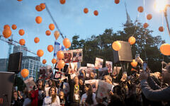 Orange balloons have become a symbol of the Bibas family because of the abducted children's red hair. (Miriam Alster/Flash90 via JTA)