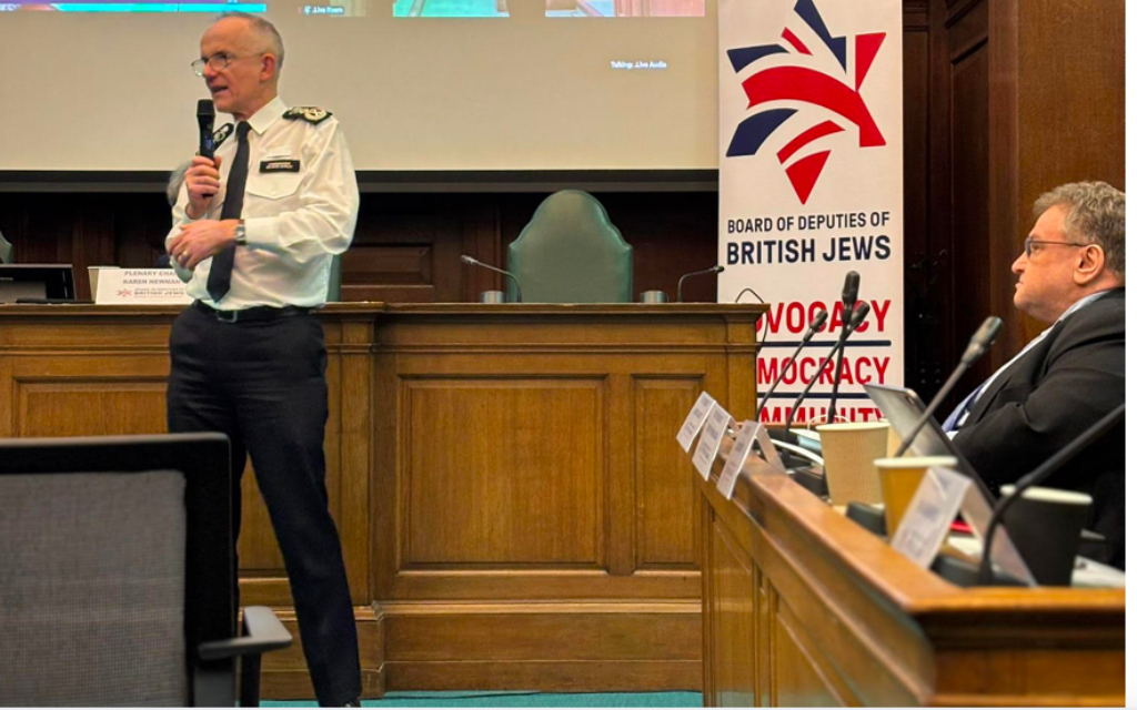 Met Commissioner Sir Mark Rowley addresses Deputies at plenary, with Board vice-president Andrew Gilbert listening (right)