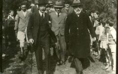 Menachem Ussishkin, Chairman of the KKL Board alongside Moshe Sharett and Yosef Weitz, walking between rows of kindergarten children from Nahalal. The children's parents, who were residents of Nahalal, were employed by KKL in tree-planting work, including the planting of King George Forest, which was inaugurated during the ceremony. Courtesy of the Central Zionist Archives, KKL-JNF Central Office Archives, Jerusalem Menachem Ussishkin, Chairman of the KKL Board alongside Moshe Sharett and Yosef Weitz, walking between rows of kindergarten children from Nahalal. The children's parents, who were residents of Nahalal, were employed by KKL in tree-planting work, including the planting of King George Forest, which was inaugurated during the ceremony. Courtesy of the Central Zionist Archives, KKL-JNF Central Office Archives, Jerusalem