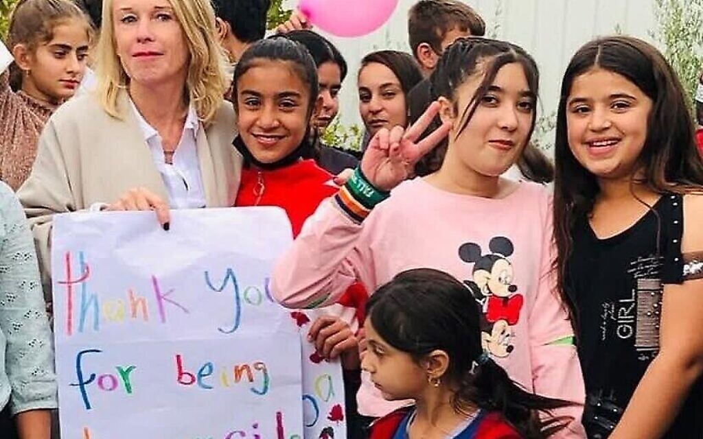 Lisa Miara with some of the Yazidi children in Shariya camp, Kurdistan, northern Iraq