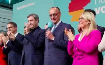 Freidrich Merz (centre)